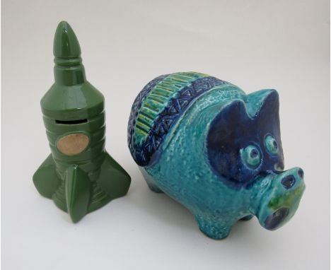 Two money boxes, West Germany Bay 501-25 pig and possibly Wade green rocket 