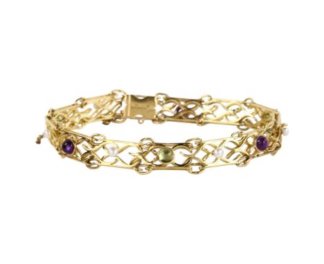 SUFFRAGETTE INTEREST - a 15ct gold amethyst peridot and pearl bracelet, openwork inter-locking design with round cabochon gem