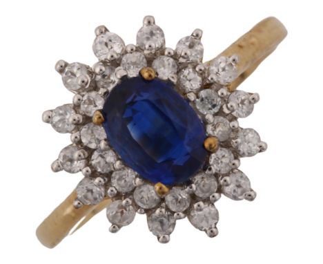 A modern 9ct gold sapphire and white sapphire cluster ring, setting height 14mm, size N, 2.7gNo damage or repairs, all stones