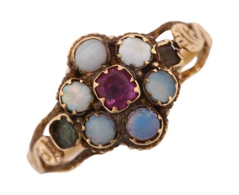 A Victorian ruby opal and paste cluster flowerhead memorial ring, with concave glass covered panel reverse and foliate engrav