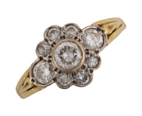 An 18ct gold diamond cluster flowerhead ring, set with modern round brilliant-cut diamonds, total diamond content approx 1ct,