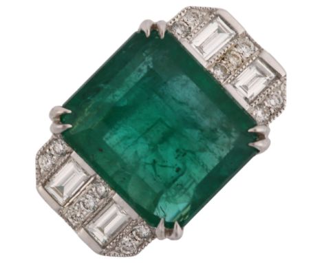 A modern 18ct white gold emerald and diamond ring, in Art Deco style, set with 2.5ct emerald-cut emerald with baguette and mo