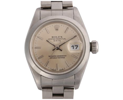ROLEX - a lady's stainless steel Oyster Perpetual Date automatic bracelet watch, ref. 69160, circa 1999, silvered dial with b