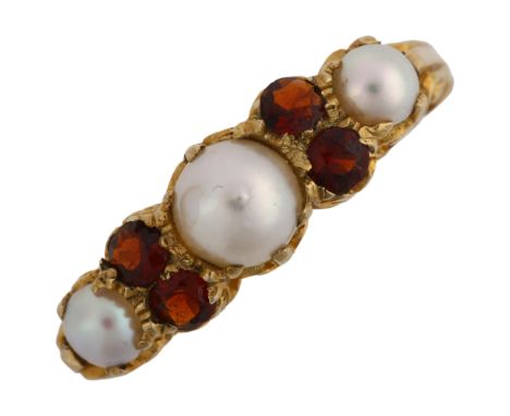 A late 20th century 9ct gold pearl and garnet half hoop ring, hallmarks London 1970, setting height 6.4mm, size N, 2.7gNo dam