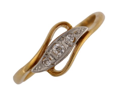 A mid-20th century 18ct gold three stone diamond crossover ring, set with single-cut diamonds, total diamond content approx 0