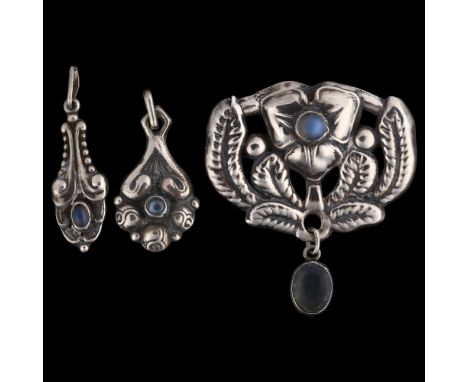 CARL M COHR - a set of Art Nouveau Danish silver and moonstone floral jewellery, comprising 1 x brooch, and 2 x pendants, bro