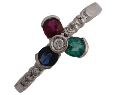 A modern 18ct white gold gem set flowerhead dress ring, gemstones include ruby sapphire emerald and diamond, setting height 9