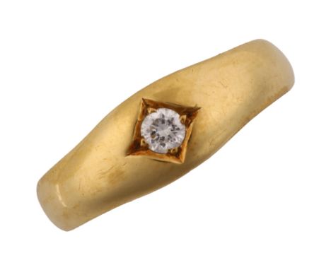 An early 20th century 18ct gold solitaire diamond gypsy ring, set with a 0.1ct modern round brilliant-cut diamond, setting he