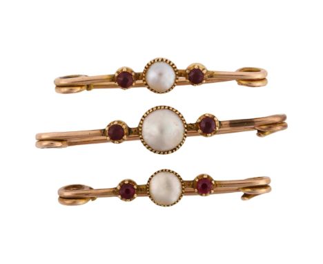 A cased set of Antique lady's lingerie pins, unmarked rose gold settings with blister pearl and garnet, largest length 37.9mm