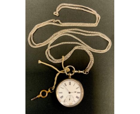 A continental fine silver open face pocket watch, enamel dial, bold Roman numerals, key wind movement, suspended from a silve