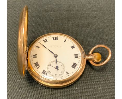A George V 9ct gold hunter cased pocket watch, white enamel dial, bold roman numerals, subsidiary seconds, 9ct gold case and 