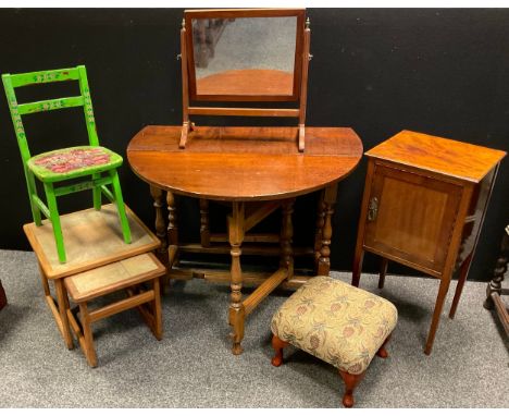 A 19th century oak gate leg dining table, a Victorian mahogany bedside cabinet;  a child’s painted elm chair, with folk art s