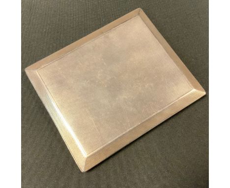 A George V silver cigarette case, engine turned body, London 1932, 5.79ozt