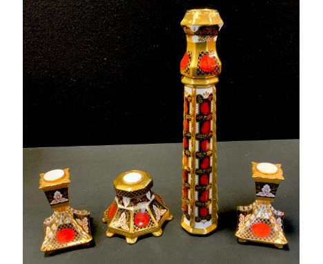 A pair of Abbeydale Chrysanthemum pattern boudoir candlesticks, 11cm high, printed marks;  a similar tall candlestick, 40cm h