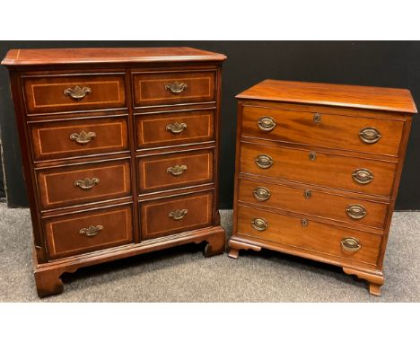 A George III style mahogany commode, the lift up top with moulded edge, four false cock-beaded drawers, bracket feet, 81cm ta