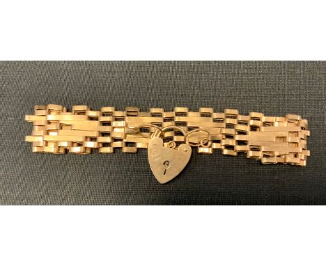 A 9ct gold fancy link gate bracelet, padlock clasp, 12.3g 