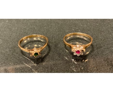 Rings - a diamond and emerald floral cluster ring, 9ct gold shank, size N, 1.6g gross;  another ruby and diamond, 9ct gold sh