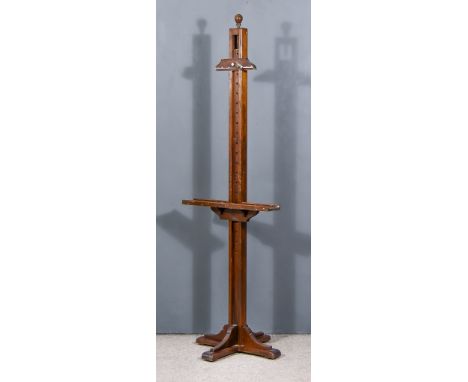A Stained Pine Artist's Easel, with turned finial and x-pattern base, 70ins high