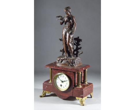 A Late 19th/Early 20th Century Red Flecked Marble Gilt Metal Mounted and Bronzed Spelter Mantel Timepiece by G Megnon, No.236