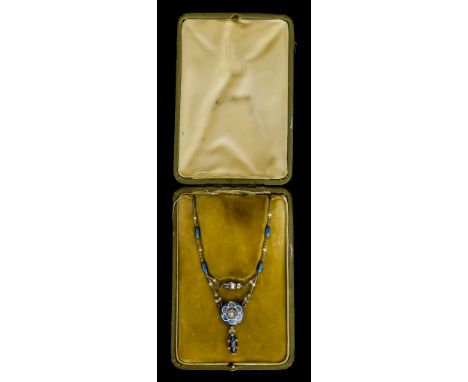 A Diamond, Pearl and Enamel Necklace, Early 20th Century, with yellow and white metal pendant, of geometric form, engine turn