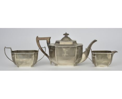 A George V Silver Octagonal Three Piece Tea Service, by Thomas Bradbury &amp; Sons Sheffield 1925, with moulded and engraved 