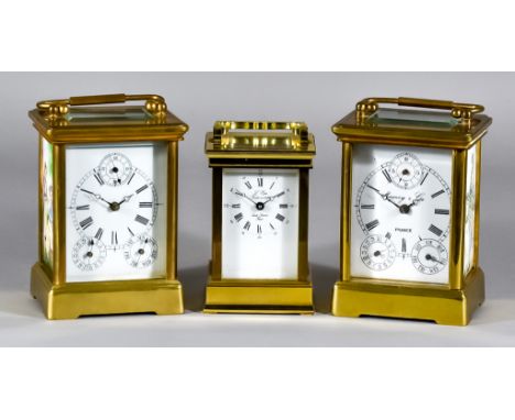 Two 20th Century Brass and Porcelain Cased Carriage Timepieces and One Other, the two timepieces each with white enamel dials