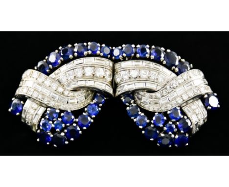 A Pair of White Metal Sapphire and Diamond Clips/ Brooch at Will, 20th Century, set with brilliant cut and baguette diamonds,