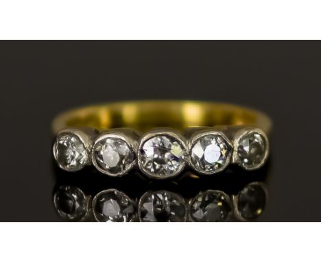 An 18ct Gold Five Stone Diamond Ring, 20th Century, set with five brilliant cut white diamonds, approximately .75ct total, si
