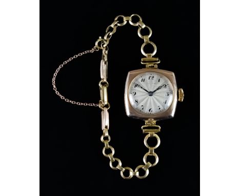 A Lady's 9ct Gold Manual Wind Wristwatch, Early 20th Century by Rolex, 36mm diameter case, silvered dial with black Arabic ba