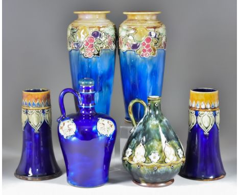 Ten Royal Doulton Stoneware Pieces, including - bulbous flask decorated with blue and brown Art Nouveau style motifs on a dar