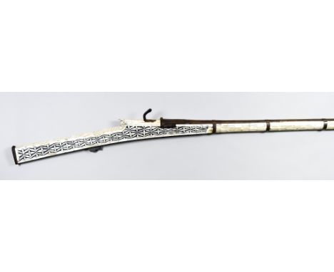 A Mother of Pearl Inlaid Tribesman's Under Arm Match Lock Musket, 41ins round steel barrel, stock and fore end profusely inla