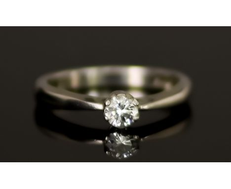 A White Metal Solitaire Diamond Ring, 20th Century, set with a brilliant cut white diamond, approximately .25ct, size K, gros