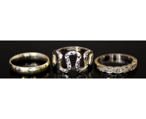 Three White Gold Rings, comprising - a 9ct wedding band, size Q,&nbsp; an 18ct half eternity, size Q, and a 9ct abstract desi