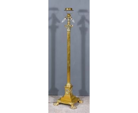 A Brass Standard Lamp of Corinthian Column Pattern, on square stepped base with bold paw feet, 55.5ins high, and shade for sa