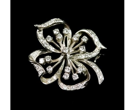 An 18ct White Gold Diamond Bow Brooch, 20th Century, set with small brilliant cut white diamonds, approximately .75ct total, 