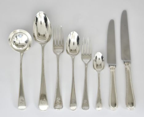 A Georgian Harlequin Silver Table Service for Eight Place Settings, various makers and dates, with bead mounts, comprising - 