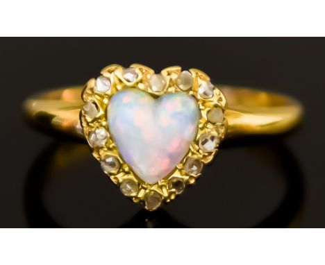 A Yellow Metal Heart Shaped Opal and Diamond Ring, 19th Century, set with a centre opal, 6mm x 6mm surrounded by old cut diam