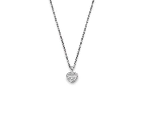 Chopard: A 'Happy Diamonds' pendant The heart-shaped glazed panel holding three 'floating' round brilliant-cut diamonds, in a