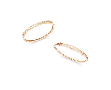 Two diamond bangles Both of hinged design, the first claw-set to the front with seventeen round brilliant-cut diamonds, stamp