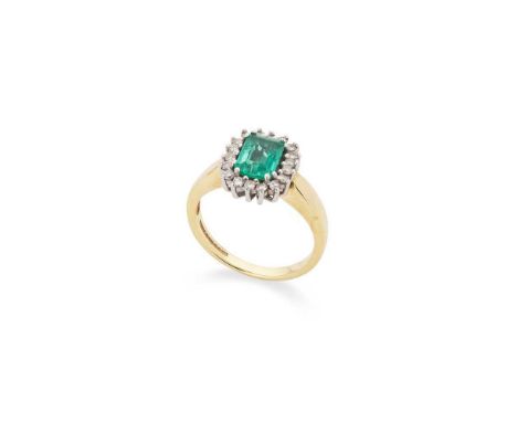 An emerald and diamond cluster ring Claw-set with a cut-cornered rectangular step-cut emerald, weighing approximately 0.70cts