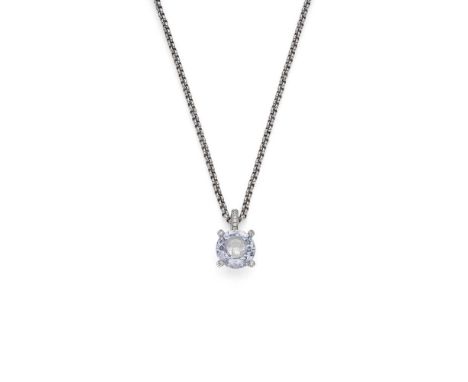 Chopard: A 'So Happy' rock crystal and diamond pendant The rock crystal with a central recess holding a 'floating' round bril