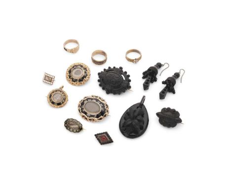 A collection of mourning jewellery Including four black enamel and plaited hair mourning brooches, various jet or black lacqu