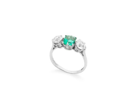 An emerald and diamond three-stone ring Claw-set with a cut-cornered square-cut emerald, weighing approximately 0.95cts, and 