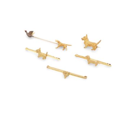 A collection of five 'sporting' brooches Including one modelled as a gun-dog and pheasant with enamel detail, another bar bro