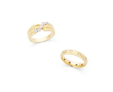 Two diamond rings The first gypsy-set with ten round brilliant-cut diamonds, modelled in 18ct gold; the second collet-set wit