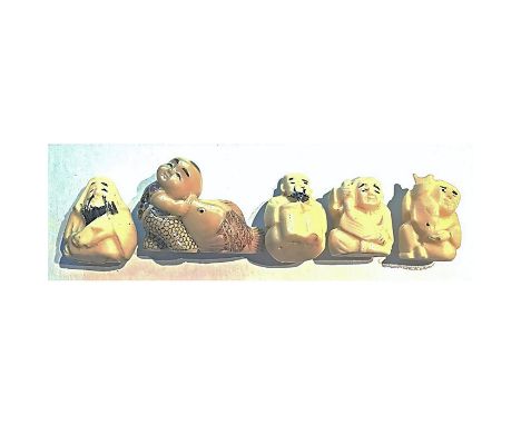 A group of 5 large size 20th century division 4 Netsuke.These are classified in the NBS in division 4. The Asian people didn'