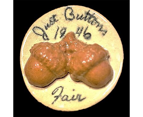 1 Large 1940's ceramic button of two Acorns and a verbal..Here is a the button I spoke of in a previous lot, the one made for