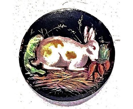1 Small 19th century enamel rabbit button.I have never seen this button before and imagine my surprise when I opened a consig