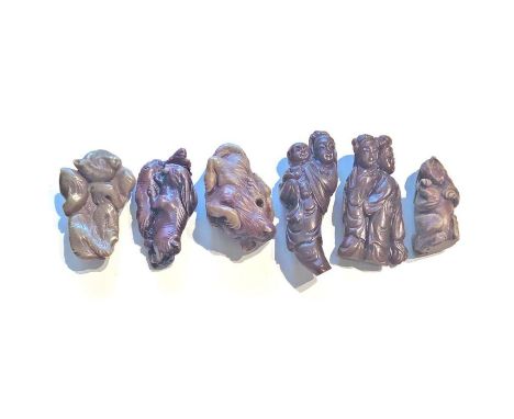 A group of 6 large size 20th century division 4 Netsuke.These are classified in the NBS in division 4. The Asian people didn'