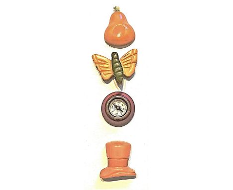 4 Medium 1930's assorted pictorial Bakelite buttons.This lot includes some fun chunky Bakelite examples, It includes a two co